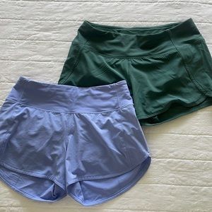 Two pairs of Lululemon Run Times Short - lavender and green, both size 4